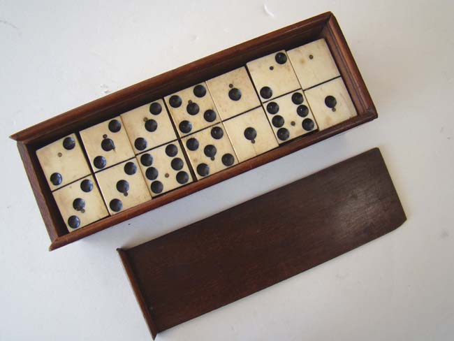 A fine boxed set of Civil War era bone and ebony dominoes circa 1860-1870